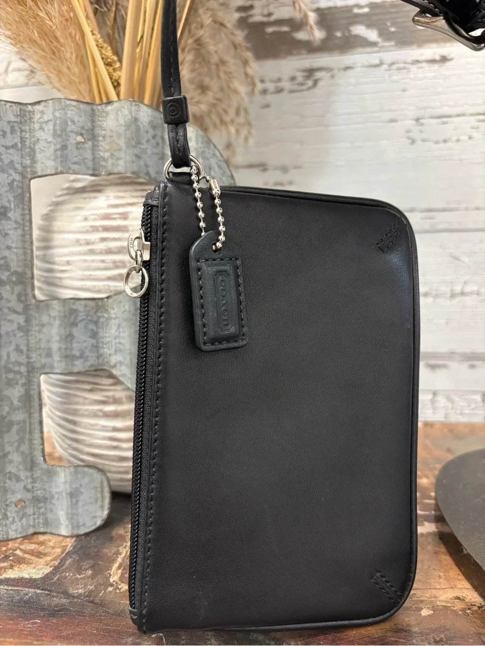 Coach Black Leather Drawstring Backpack with Silver Buckle